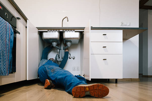 Professional Plumbing technician working in Hancock, MI
